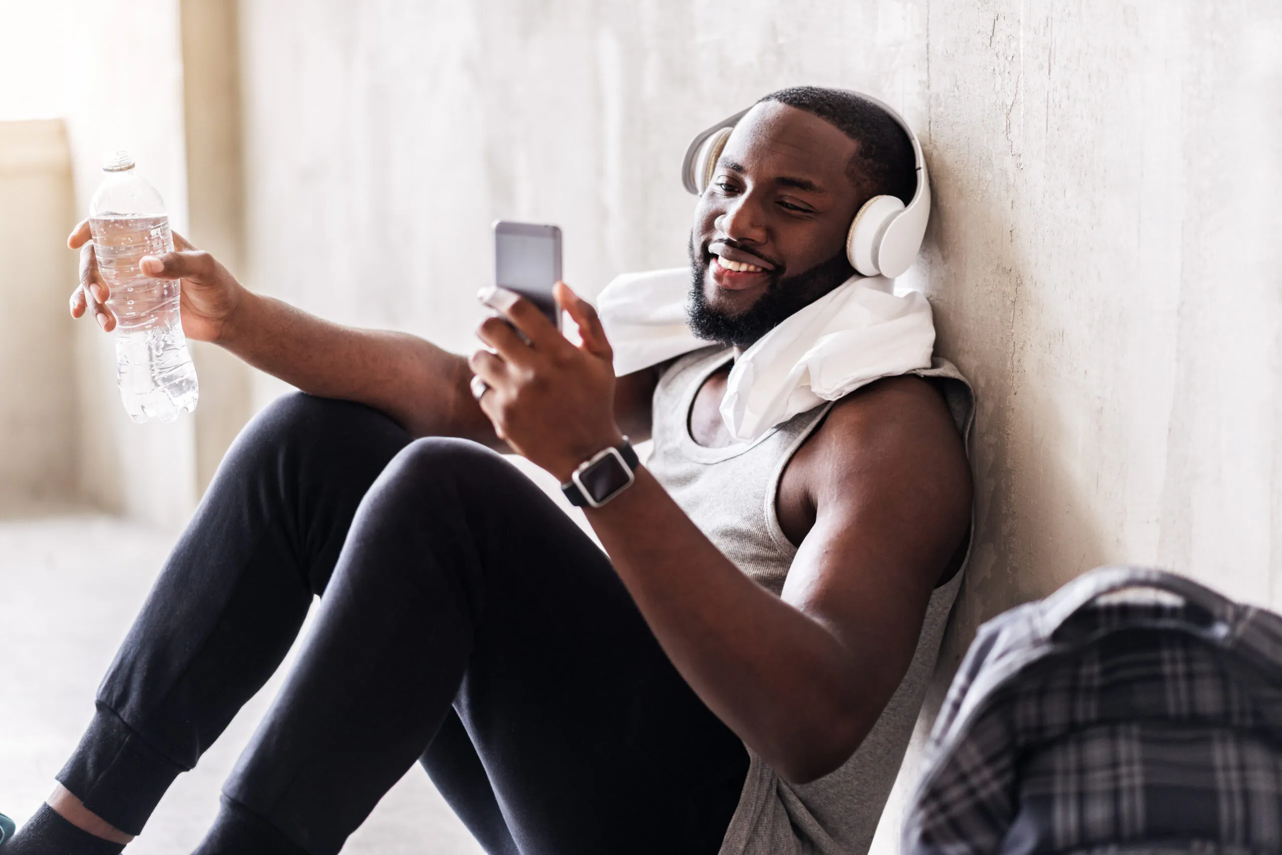 Cheerful handsome african sportsman in process of recreation